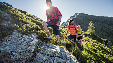 Group hiking in the mountains of Saalbach Hinterglemm